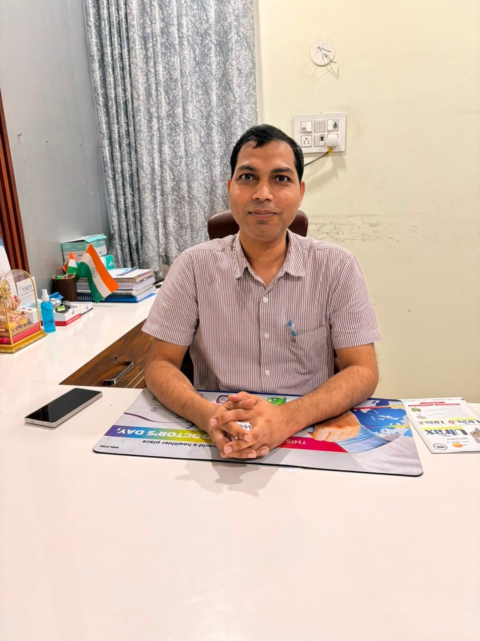 Dr. N. Ray